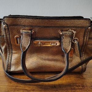 Coach Swagger 20 handbag in metallic bronze grained leather Mini